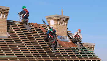 men working on new roof