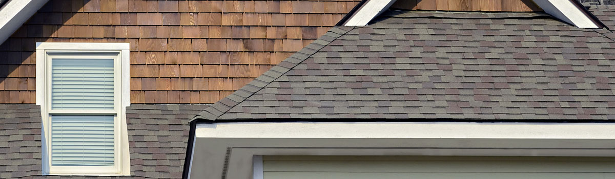 Madge Roofing Inc shingles house roof