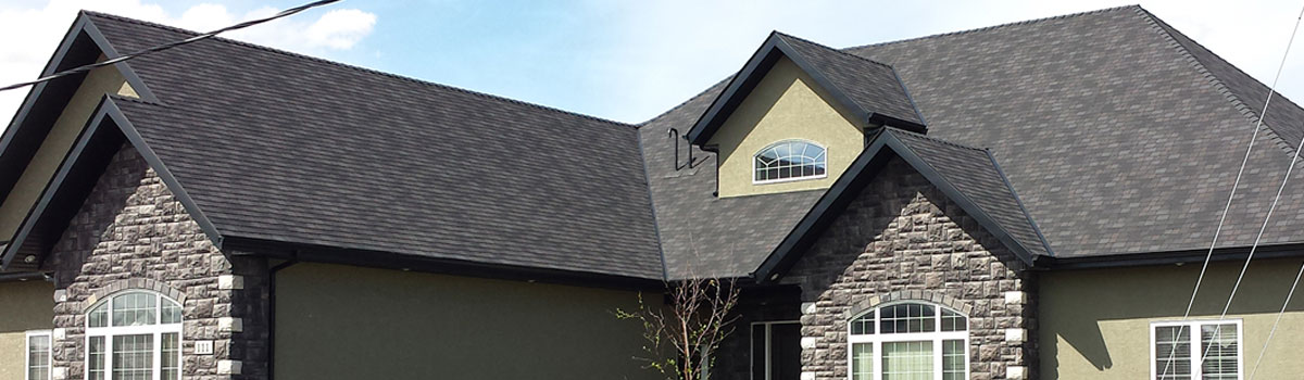 Madge Roofing Inc two story home roof